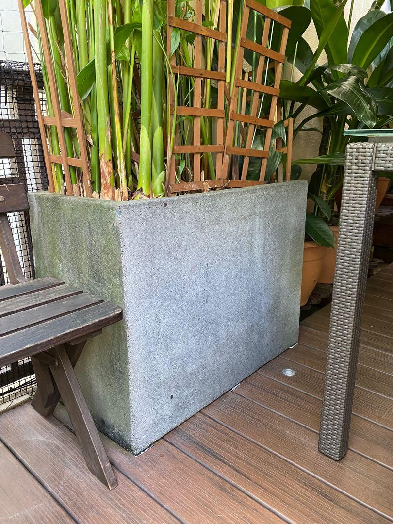 Rectangular Stone Planter. (Category: Pots & Planters) located in Singapore. Submitted by tanklsg (Listing ID 1128561296, Image 2). Description: Rectangular stone planter. Length 80cm. Width 40cm. Height 60cm. Very heavy and stable. Good for decor and for growing plants to enhance privacy. Selling cheap at $180. One of a kind..