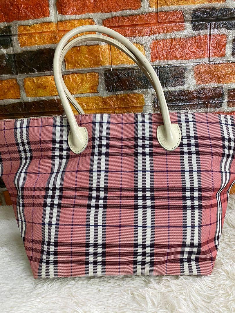 Authentic Burberry blue label tote bag (Category: Luxury Bags & Wallets) located in Cagayan de Oro. Submitted by riggstuffs (Listing ID 1123447311, Image 1). Description: Preloved bag from Japan source Guaranteed authentic The Exterior area is in pronating condition, with no rubs or holes at each corner The Interior area is clean and has no stains The strap has some little scuffs and signs of use is clear DISCLAIMER: Riggstuffs is not affiliated 
