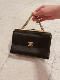 Chanel handle flap bag