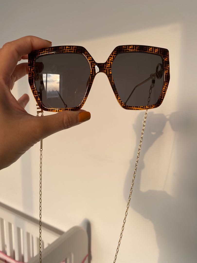 Fendi sunglasses shop with chain