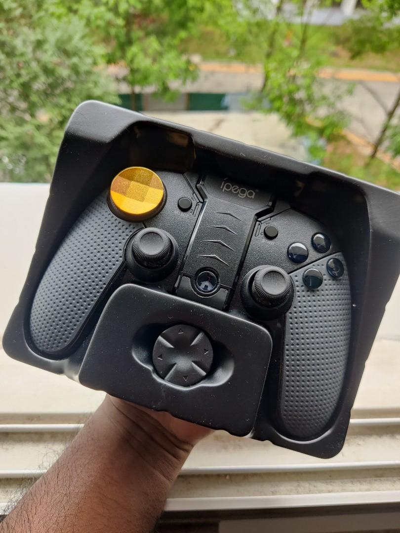 Ipega Wireless Controller (Category: Controllers) located in Singapore. Submitted by shawnc0991 (Listing ID 1123369669, Image 3). Description: Item is still new. Comes with the charger cable and instructions ..