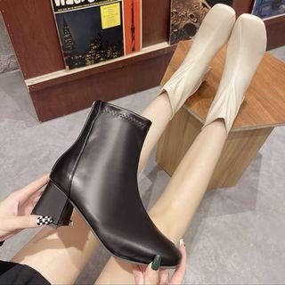 Black soft leather heel boots