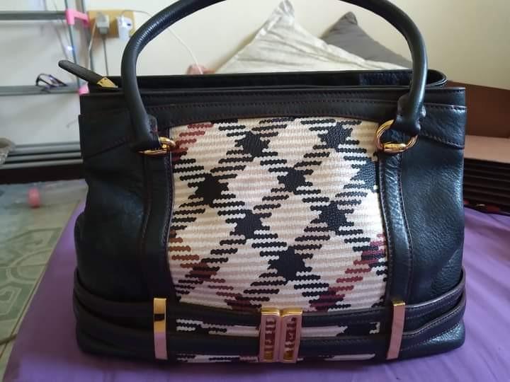 daks leather bolsa