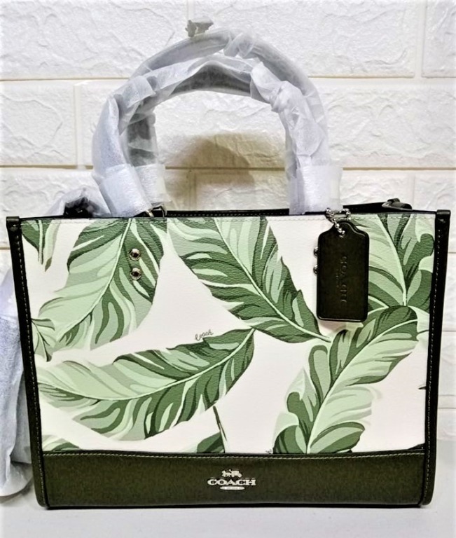 Coach dempsey carryall sales with banana leaves print