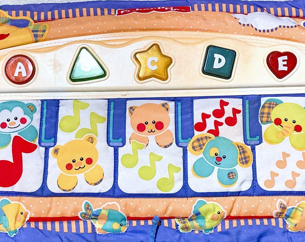 Kick piano for crib 2025