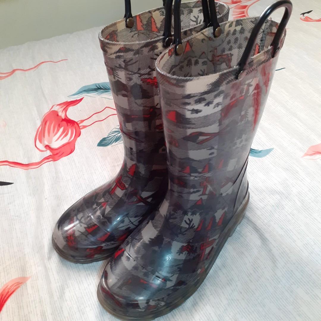 Members mark rain boots top