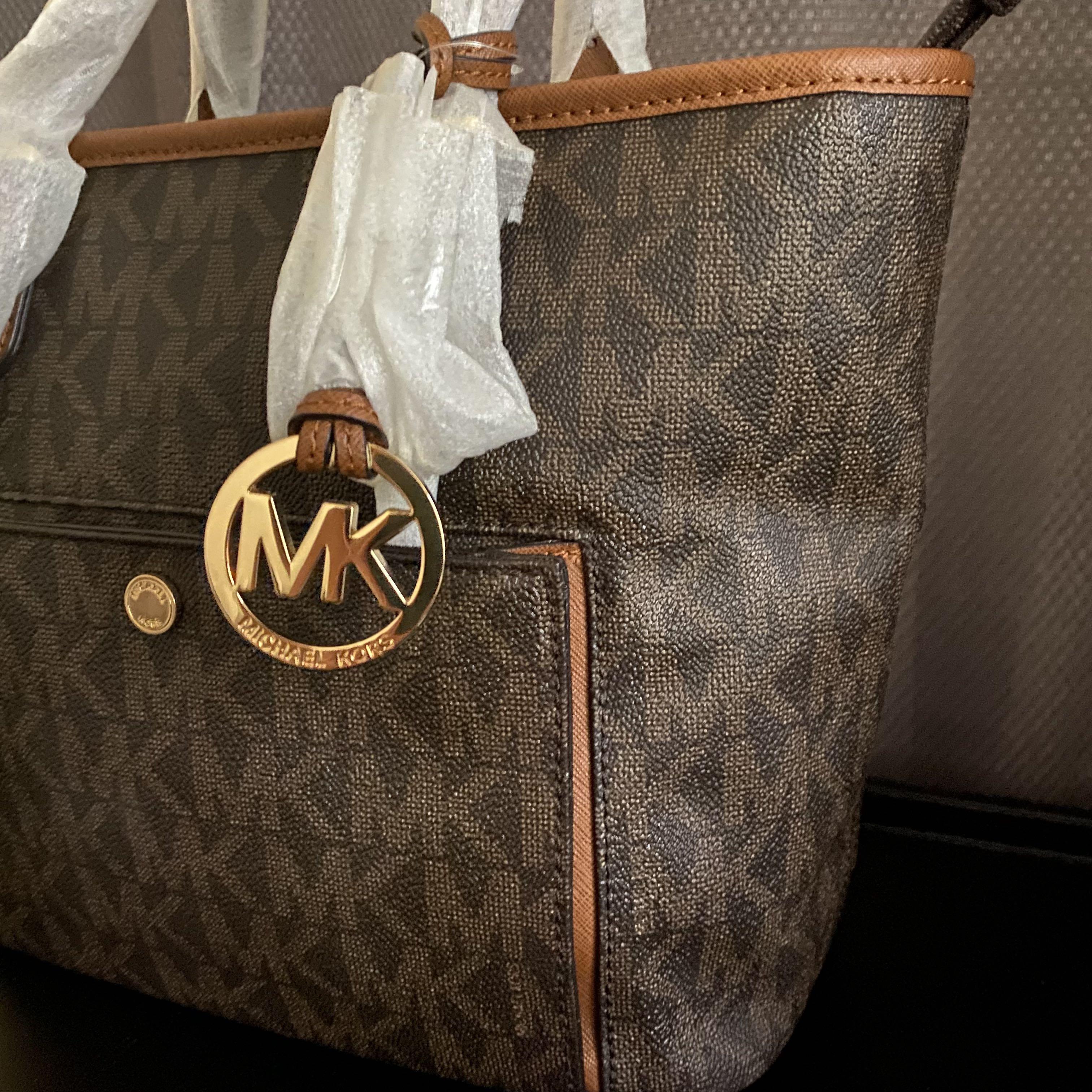 Michael kors jet set medium online top zip snap pocket tote