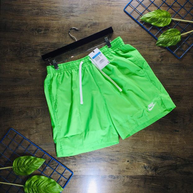 lime green nike woven shorts