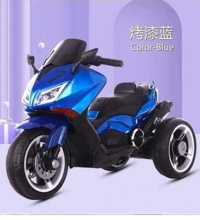 NMAX Type Motor Electric Motorcycle for Kids (Category: Motorbikes for Sale) located in Manila. Submitted by sportshubb (Listing ID 1128784986, Image 1). Description: NMAX Type Motor Electric Motorcycle for Kids Rechargeable With lights and music Manually driven 3 wheels Recommended age: up to 5 y/o Price: 5199 Page: sports hubb 09558494266 - Globe 09704796090 - Smart or Sun (02)7-527-1708 - Landline We can do door to door cash-on-delivery (COD) 