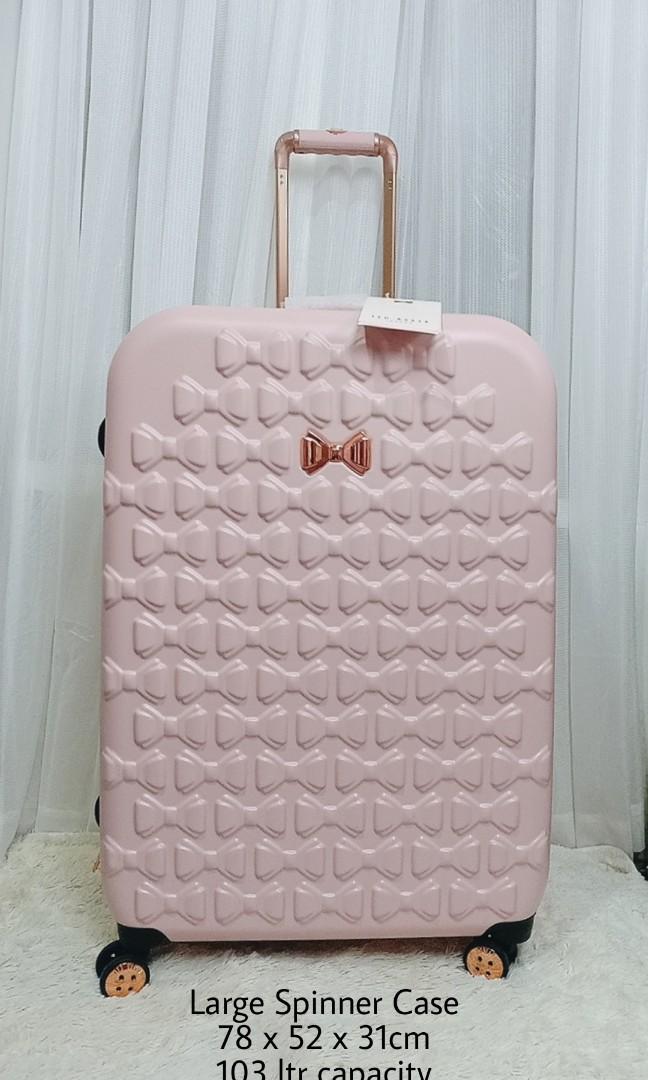 Pink bow suitcase hotsell