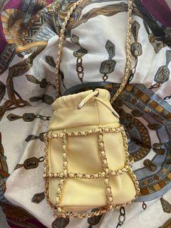 Chain detail mini bucket bag