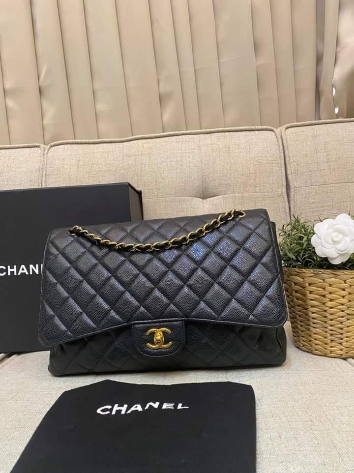 Chanel Maxi Black Caviar Single Flap GHW (Category: Luxury Bags & Wallets) located in Manila. Submitted by bagislifeshop (Listing ID 1123520825, Image 1). Description: Woot Woot!!!! Good Deal 🖤🖤🖤 100% Authentic Chanel Maxi Black Caviar Single Flap GHW Series 13xxxxxxxx Condition 8/10 Comes with Box Dustbag Entrupy Certificate and Hologram Intact.