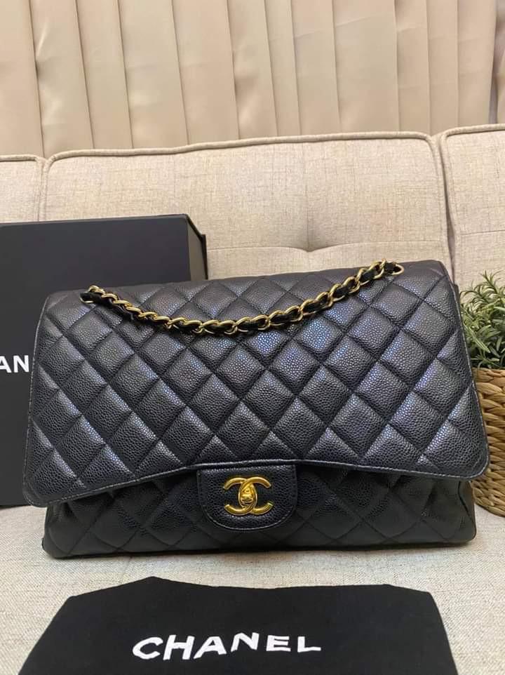 Chanel Maxi Black Caviar Single Flap GHW (Category: Luxury Bags & Wallets) located in Manila. Submitted by bagislifeshop (Listing ID 1123520825, Image 2). Description: Woot Woot!!!! Good Deal 🖤🖤🖤 100% Authentic Chanel Maxi Black Caviar Single Flap GHW Series 13xxxxxxxx Condition 8/10 Comes with Box Dustbag Entrupy Certificate and Hologram Intact.