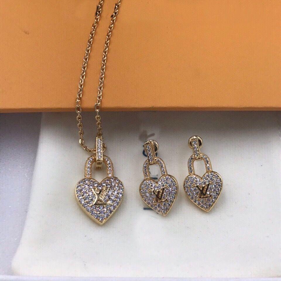 Lv heart lock rhinstone earrings and necklace 18k gold plated preorder,  Women's Fashion, Jewelry & Organizers, Earrings on Carousell