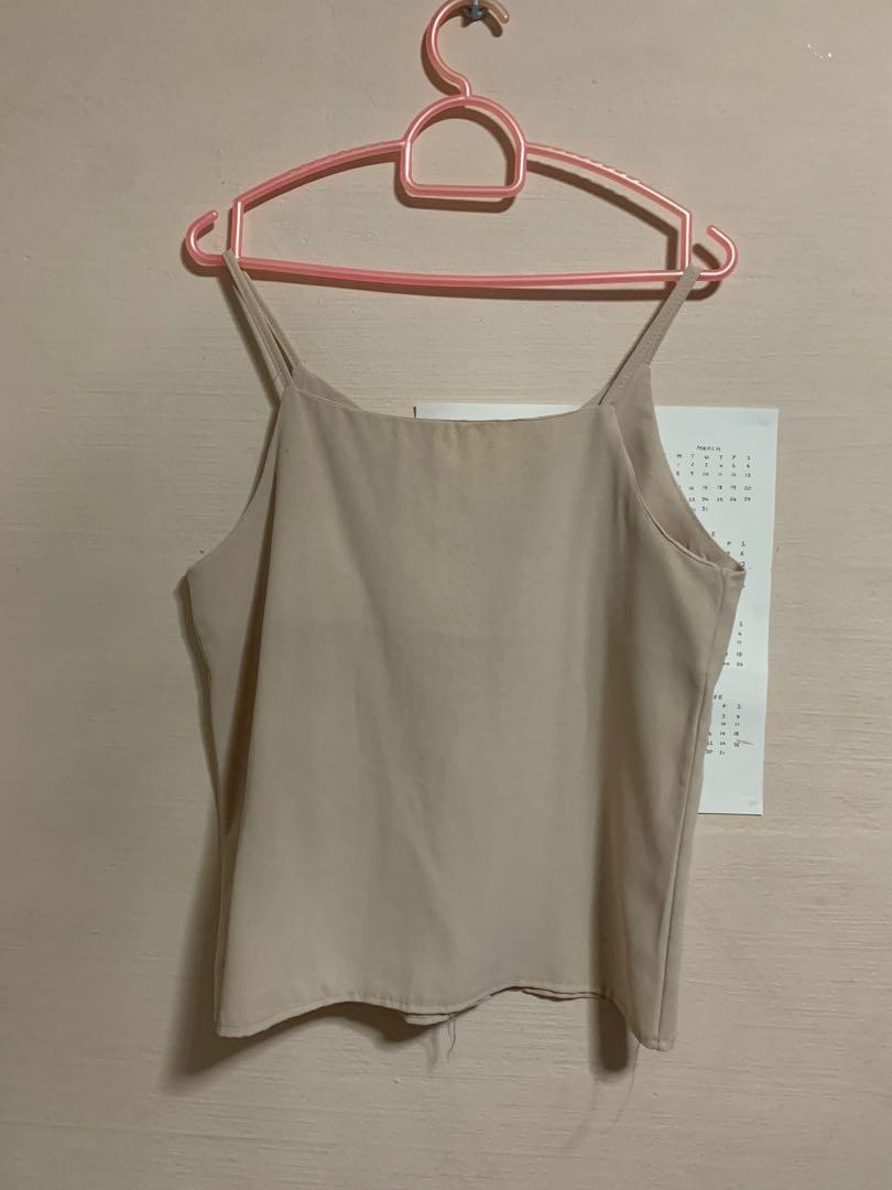 Spaghetti Strap Button Top (Category: Sleeveless) located in Singapore. Submitted by humble_wardrobe (Listing ID 1123587921, Image 2). Description: PTP - 17 inch Length - 20 inch Strap length - 37.5 inch.