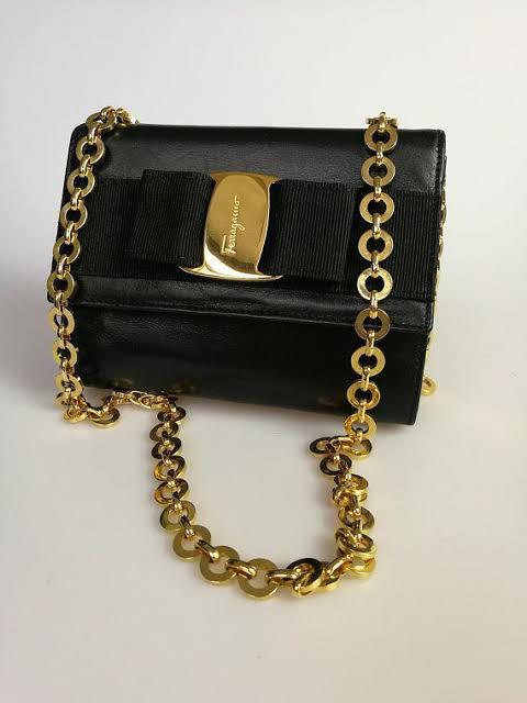 Authentic Vintage Ferragamo Evening Bag (Category: Luxury Bags & Wallets) located in Quezon City. Submitted by arieschua1219 (Listing ID 1121265871, Image 3). Description: This is a vintage ferragamo rare piece. Shiny gold hardware 100% authentic Super sossy to wear on your date nights.