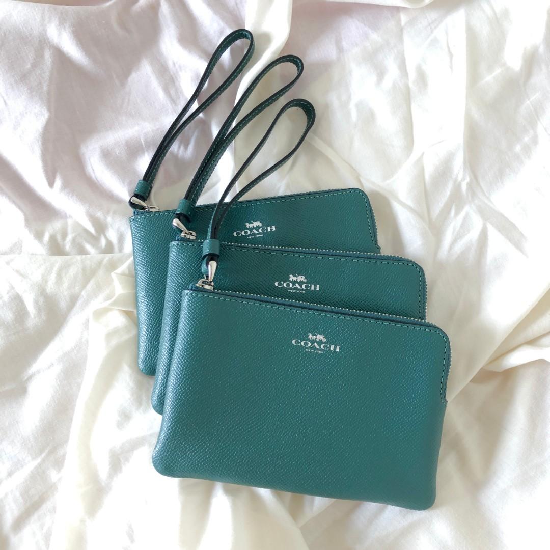 COACH Corner Zip Wristlet (Green) (Category: Purses & Pouches) located in San Mateo. Submitted by PSfinds_declutters (Listing ID 1123783524, Image 2). Description: Goods from Canada 🇨🇦 *See photos for details. - Shipped and Arrived thru AXP. - Brand New, Original and Authentic items from Canada. - All products are much affordable because we bought it from sale. - All products are onhand unless marked sold. - Feel free to message us if you want 