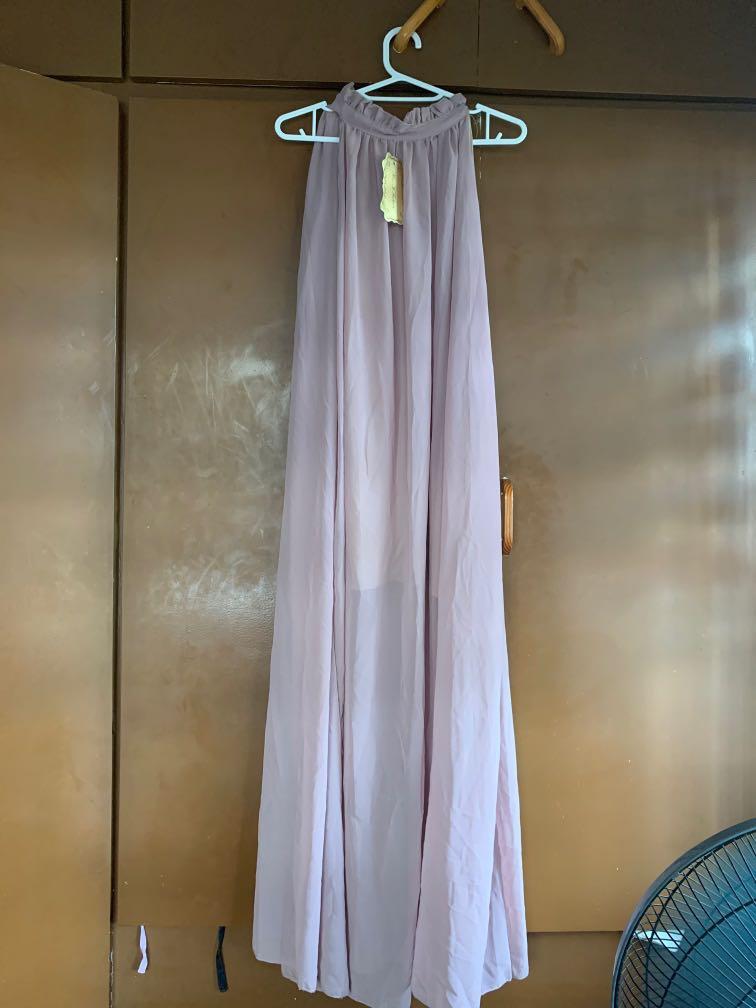 Pink/plum halter long dress (Category: Dresses) located in Paranaque City. Submitted by llfranchesca (Listing ID 1123798977, Image 1). Description: BNWT 52 inches.