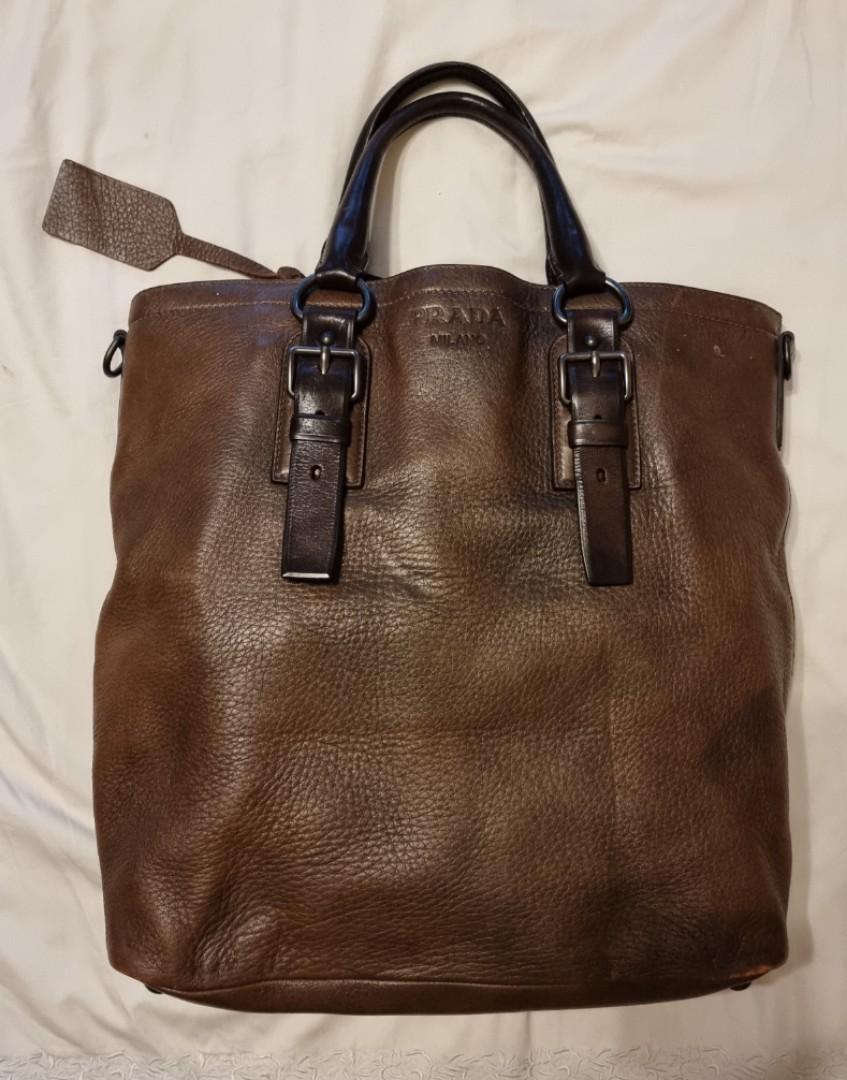 Prada Document Computer Bag (Category: Bags & Wallets) located in Singapore. Submitted by cocotango (Listing ID 1123786270, Image 1). Description: Decluttering sale. Pristine condition 9/10 soft leather yet tough work bag. Unisex. Can use for carrying laptop or documents. Used less then 5x like new. Bought from Rome for around 3k, barely used and has been in storage. My loss is your gain. Approx size W38 H40. Please do not low ball. Please do not