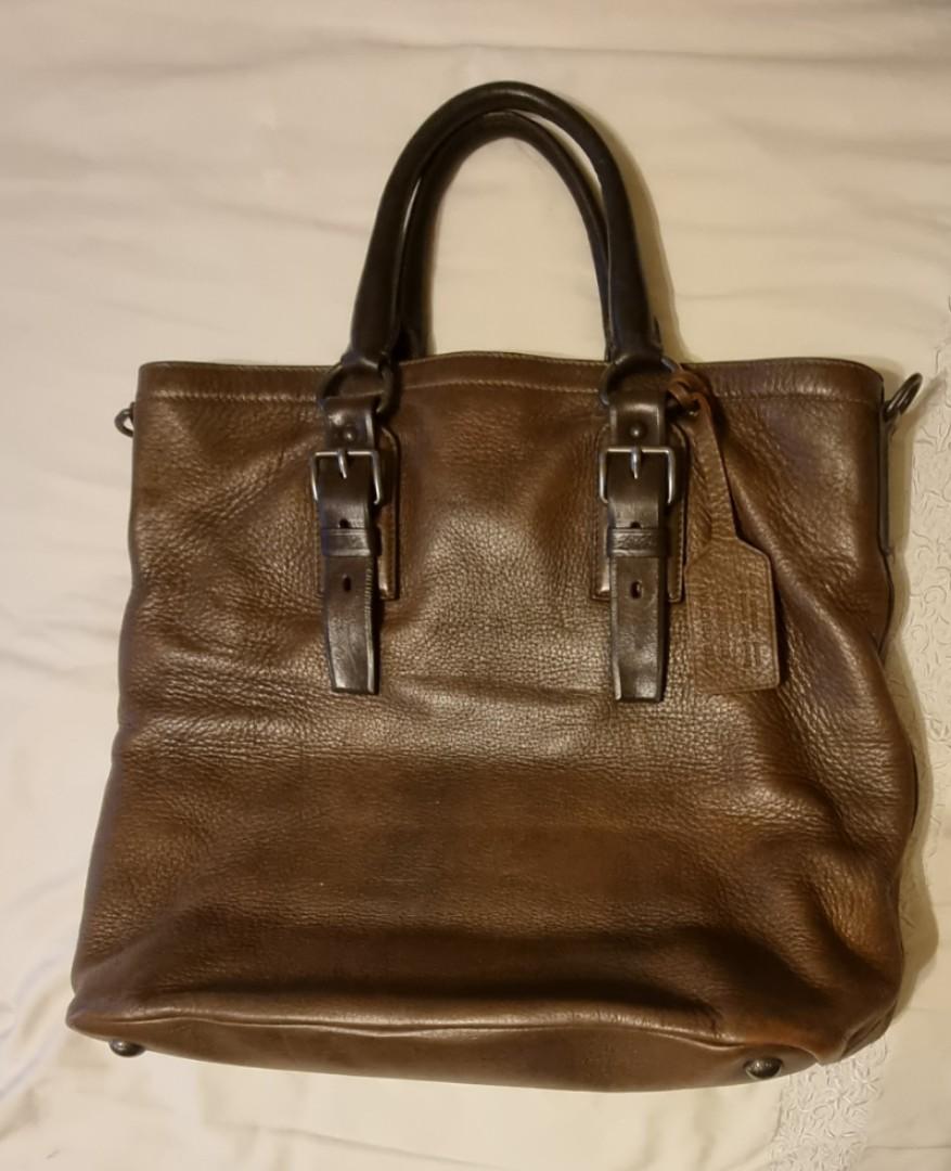Prada Document Computer Bag (Category: Bags & Wallets) located in Singapore. Submitted by cocotango (Listing ID 1123786270, Image 2). Description: Decluttering sale. Pristine condition 9/10 soft leather yet tough work bag. Unisex. Can use for carrying laptop or documents. Used less then 5x like new. Bought from Rome for around 3k, barely used and has been in storage. My loss is your gain. Approx size W38 H40. Please do not low ball. Please do not