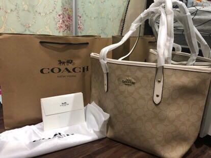 white and brown coach bag