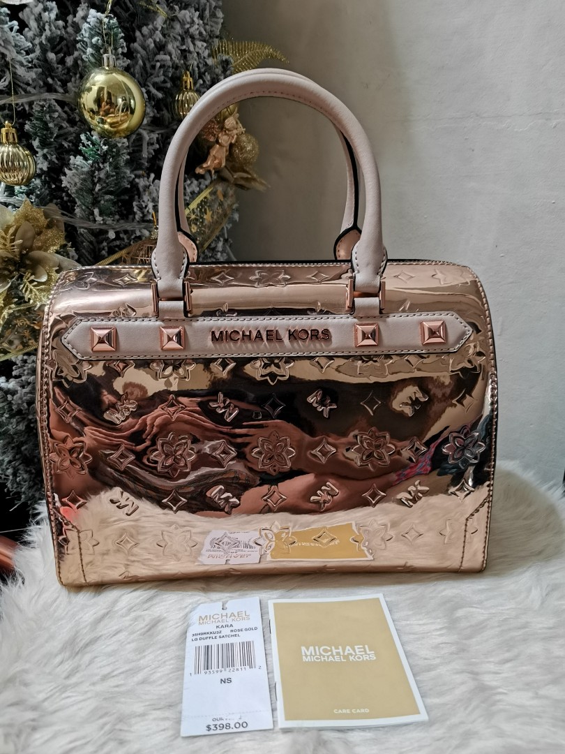 Michael kors gold duffle bag discount