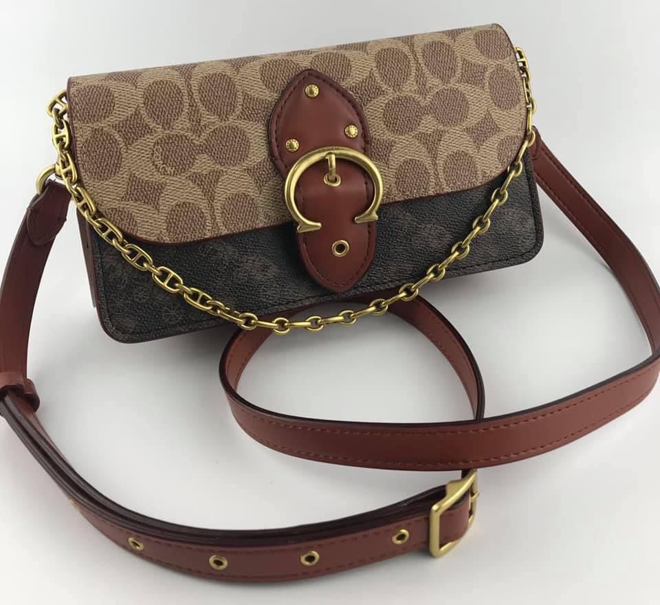 beat crossbody clutch in signature canvas with horse and carriage print