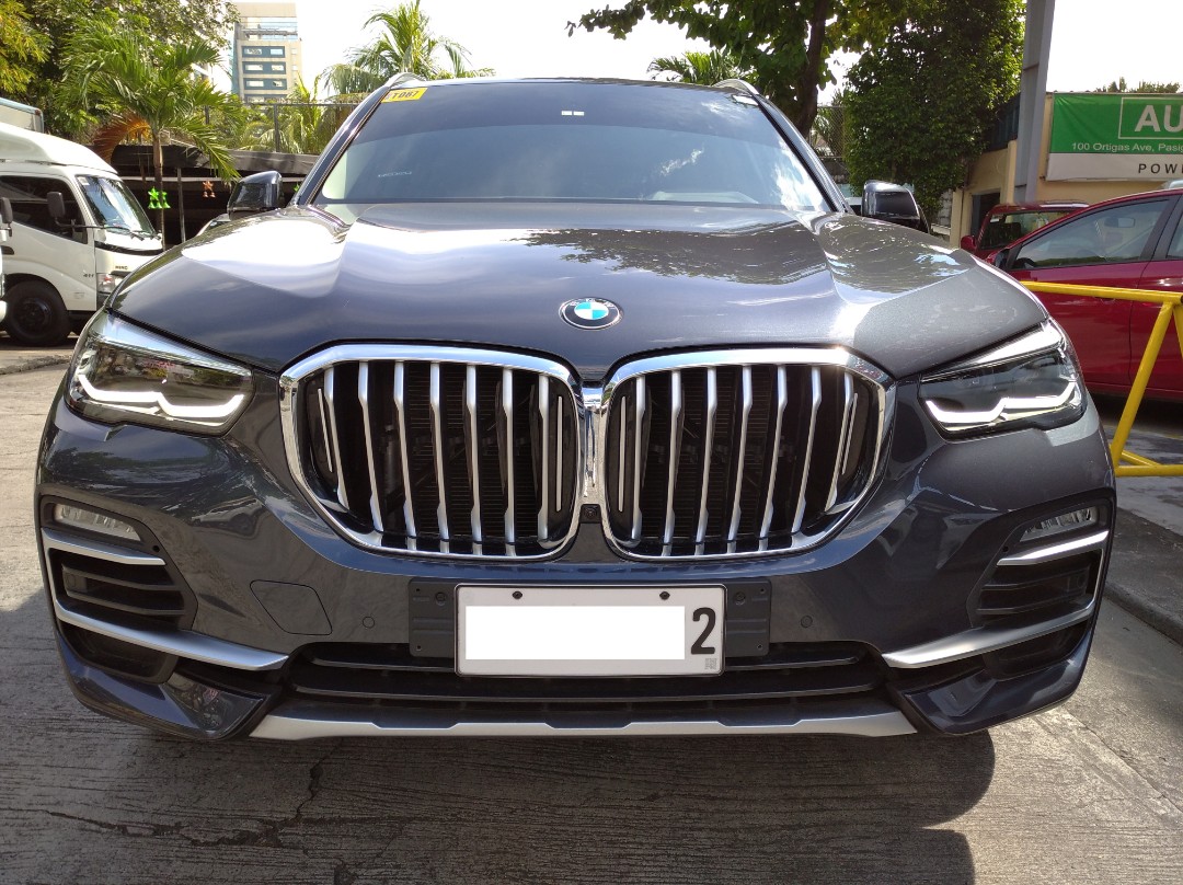 BMW X5 3.0 M50d (A) (Category: Used Cars) located in Pasig City. Submitted by Batman_Motors (Listing ID 1124119436, Image 2). Description: 2020 BMW X5 xDrive 3.0D Plate No.NFU2022 - 3.0L Turbo Diesel Engine - 8-Speed AT Steptronic AWD - 12.3" touch screen iDrive - Electronic Stability Control - Traction Control - AUX, Bluetooth, Apple CarPlay, Android Auto - Auto Climate Control - Like Brand New! We also accept bank financing and trade ins! For F