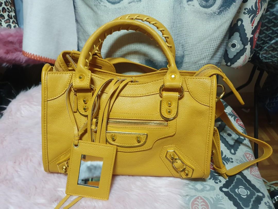 Balenciaga hotsell handbags yellow