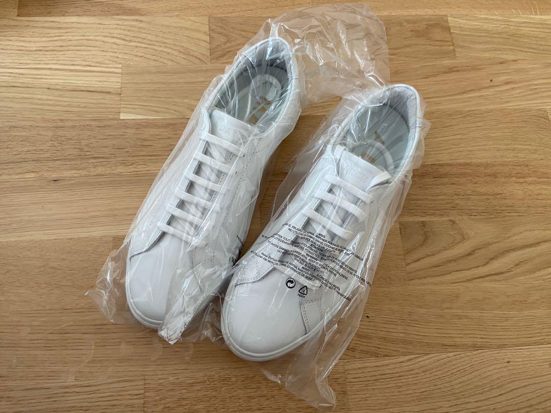 Brand new premium white Sneakers by A Day s March for sale