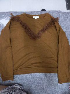 Brown sweater