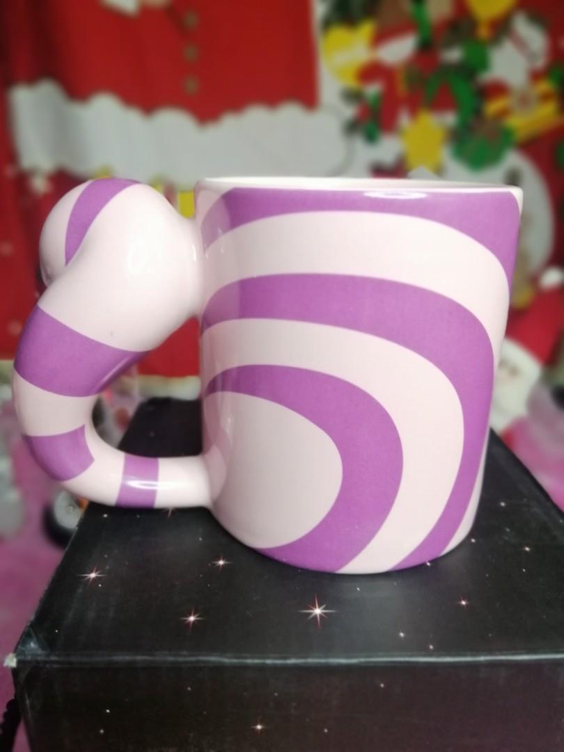 Cheshire Cat Mug (Category: Coffee & Tea Tableware) located in Caloocan City. Submitted by barlscloset (Listing ID 1124423839, Image 3). Description: Alice in Wonderland's Cheshire Cat - Embossed Cat's Face - Without Box - My collection. Never Used Please visit my FB page for more. https://www.facebook.com/The-PowerStuffed-Merch-262202391135765/.