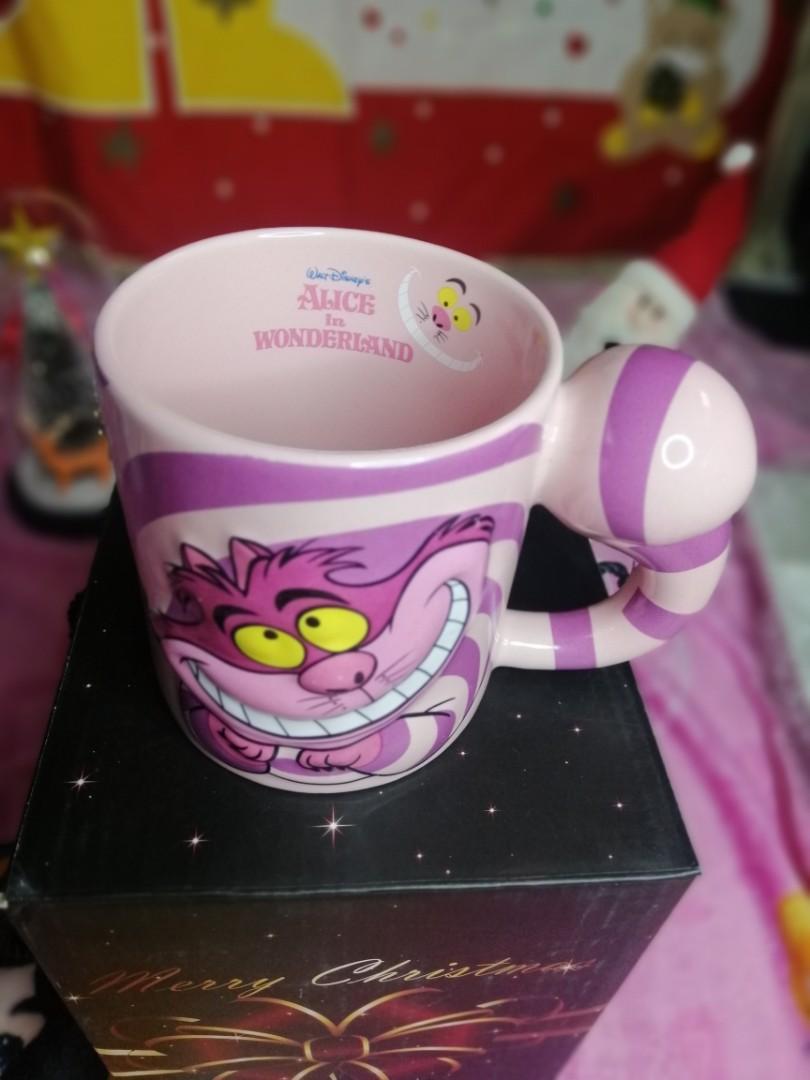 Cheshire Cat Mug (Category: Coffee & Tea Tableware) located in Caloocan City. Submitted by barlscloset (Listing ID 1124423839, Image 2). Description: Alice in Wonderland's Cheshire Cat - Embossed Cat's Face - Without Box - My collection. Never Used Please visit my FB page for more. https://www.facebook.com/The-PowerStuffed-Merch-262202391135765/.