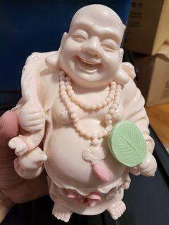 Pink ceramic Laughing Buddha