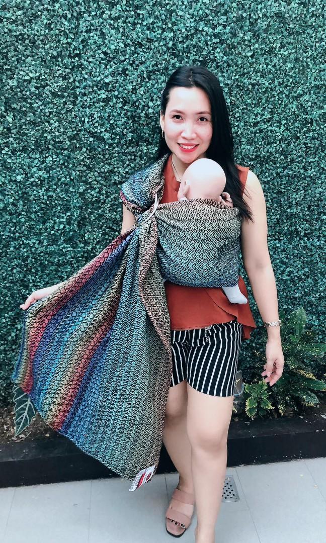 Rainbow hearts ringsling - Shadrach's Collection (Category: Carriers & Slings) located in Mandaluyong City. Submitted by thriftymhum (Listing ID 1124331305, Image 1). Description: Rainbow heart, a carrier with breathtaking beauty. Perfection in terms of color, design, thickness and quality. It gives happy vibes like how rainbow amazes us every time it pops up in the sky. Wrap your precious baby with Rainbow Heart. Perfection.Elegance.Hearty Rings