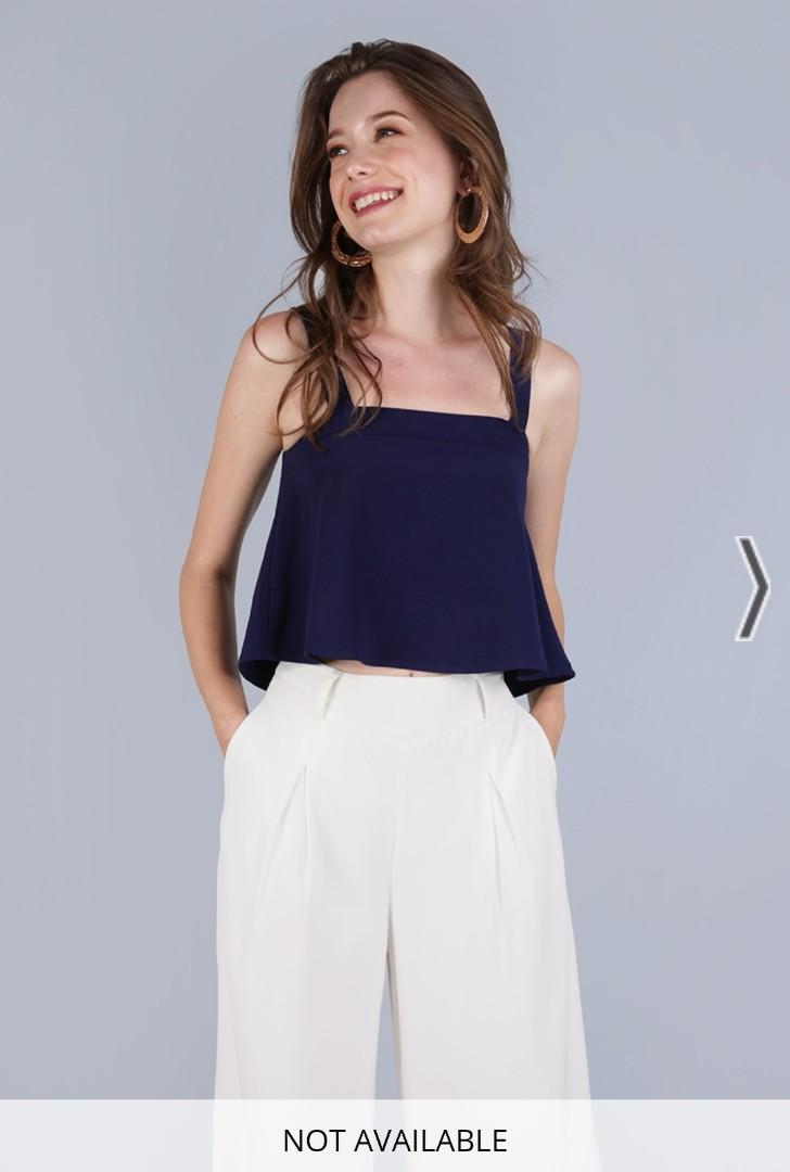 TTR Nixon flare top (navy) (Category: Sleeveless) located in Singapore. Submitted by joeychuazuer (Listing ID 1124398898, Image 1). Description: 10/10 condition, no defects at all. Tagged size XL, measurements in pic. Free normal mail. Tagged removed. But have not worn before. Only worn when trying out..