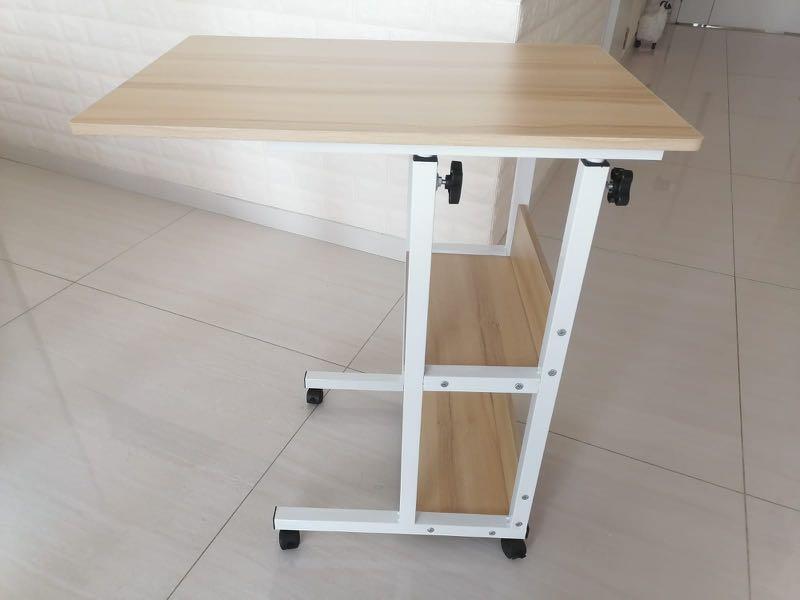 Adjustable table (Category: Tables & Sets) located in Singapore. Submitted by enquist (Listing ID 1129005661, Image 1). Description: Self collection/arrange delivery.