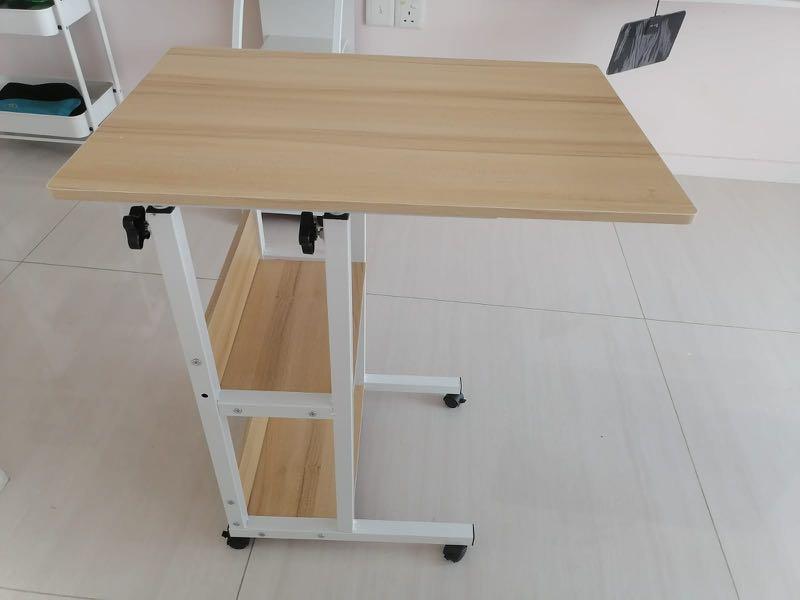 Adjustable table (Category: Tables & Sets) located in Singapore. Submitted by enquist (Listing ID 1129005661, Image 2). Description: Self collection/arrange delivery.