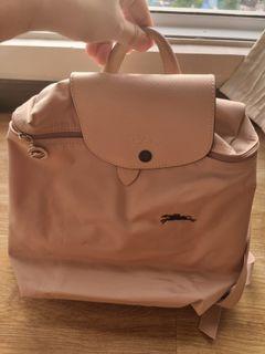 Authentic Longchamp Le Pliage rose colored backpack. Last price posted. Grab express or similar c/o buyer.