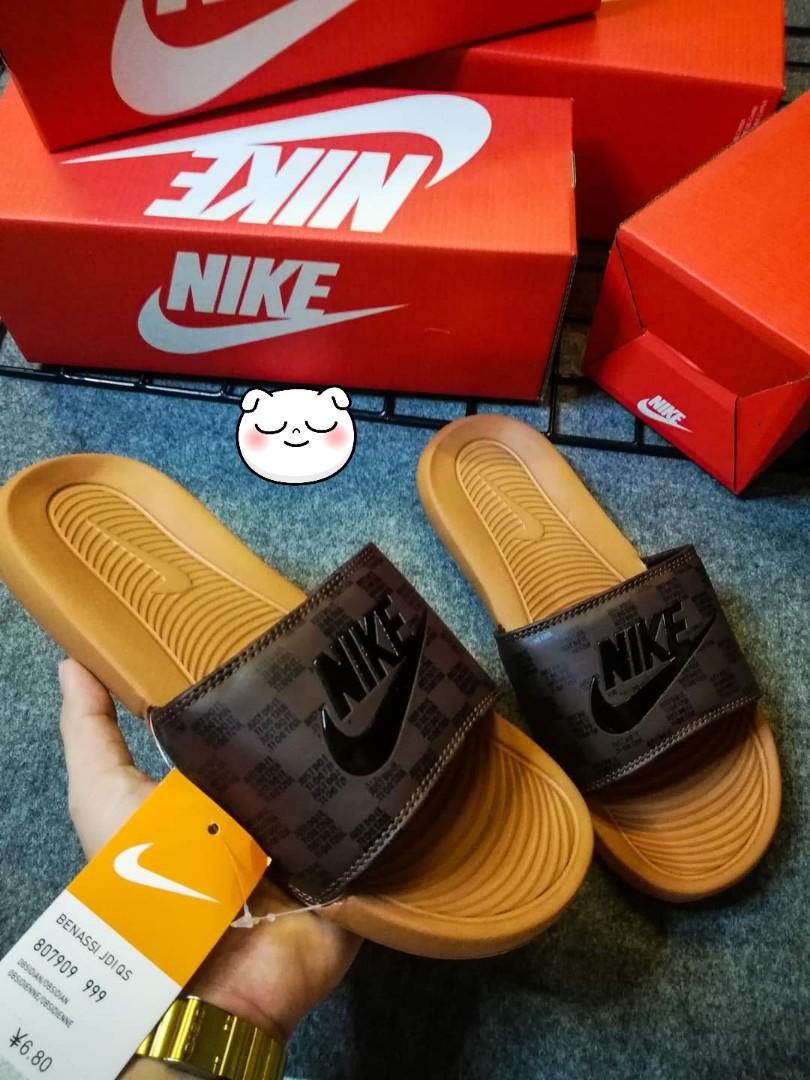 Nike slides hot sale original vs fake