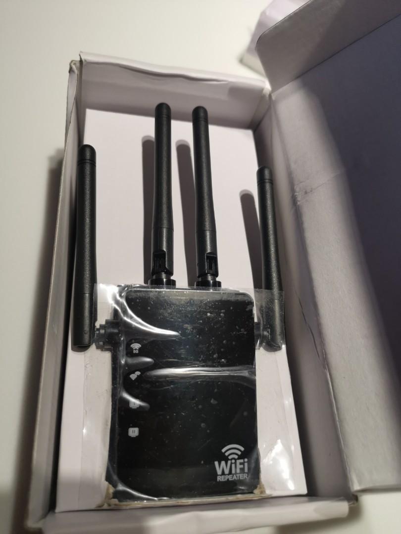 Wireless range extender (Category: Electrical, Adaptors & Sockets) located in Singapore. Submitted by scarsky (Listing ID 1129081513, Image 1). Description: • Concurrent AC1200Mbps 2.4G / 5G WiFi AP/Router-Eliminate Wi-Fi Dead Zones &Double Coverage Of your Wi-Fi With Ease, Increase your wifi signal and large coverage areas • High performance antennas- 4x 3dBi high performance antennas, Two RJ45 Fast Ethernet Ports,providing even better wireless 