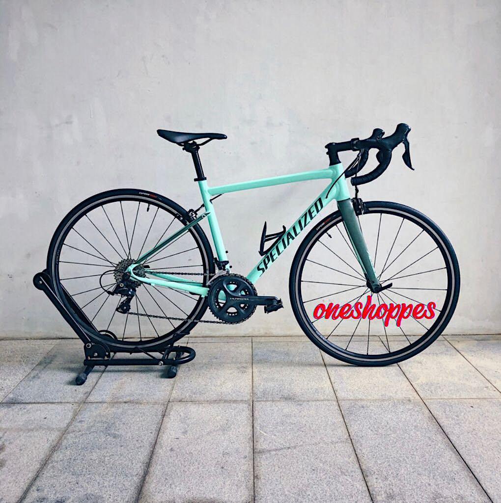 Specialized mint green top