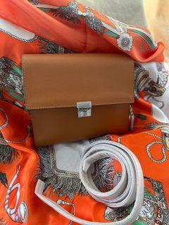 Caramel brown leather sling