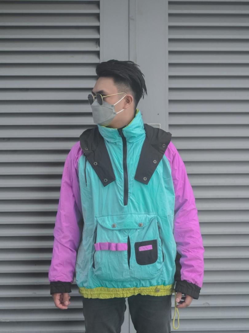 blue and green windbreaker