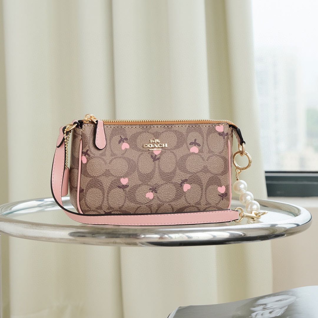 COACH® Outlet  Nolita 19 In Signature Canvas With Heart Floral Print