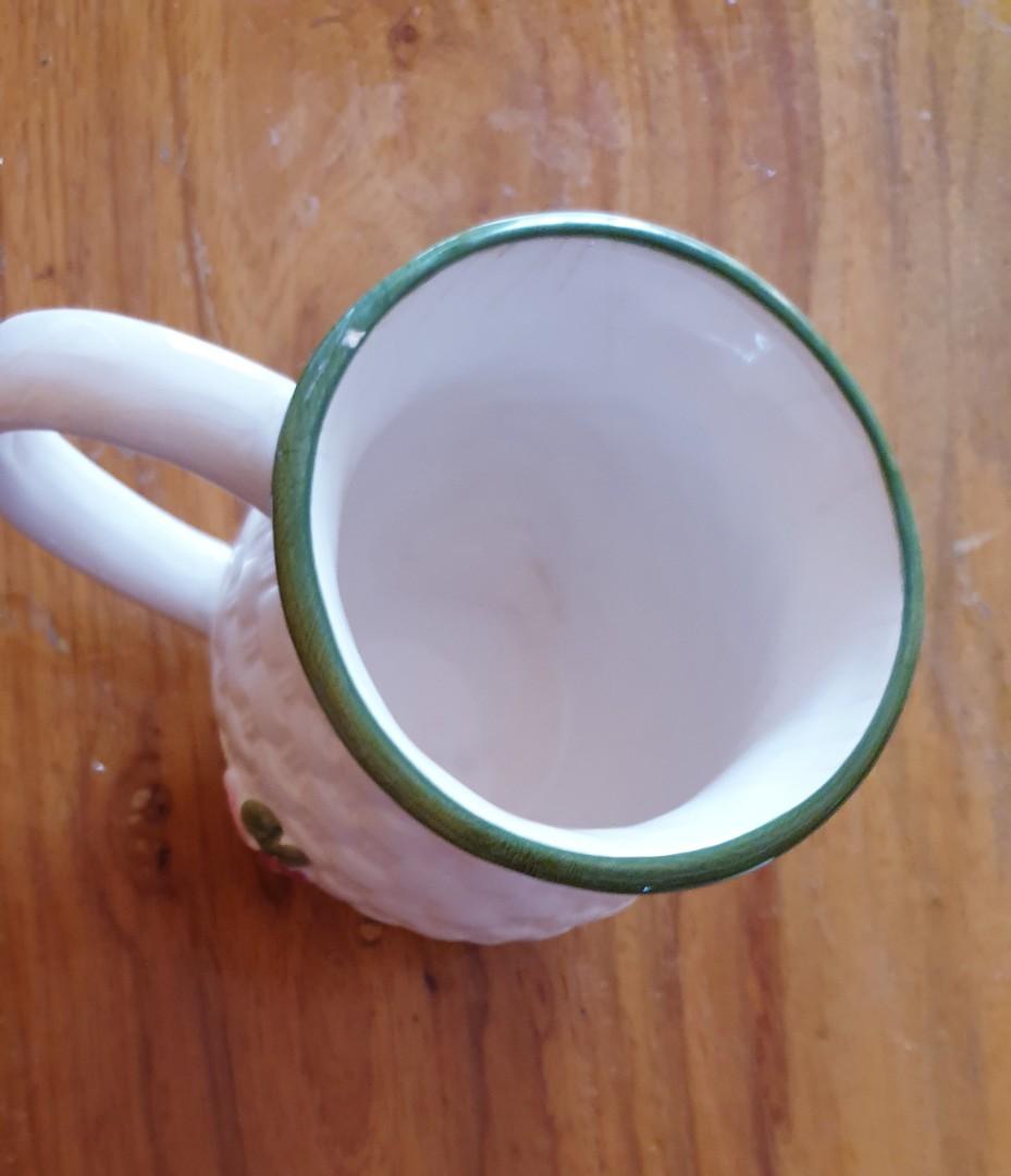 Vintage Avon bunny Mug (Category: Coffee & Tea Tableware) located in Dumaguete. Submitted by ellelopez35 (Listing ID 1130700562, Image 3). Description: Vintage Avon bunny Mug Collectible has a minor scratch & crazings due to long storage but it's still beautiful..