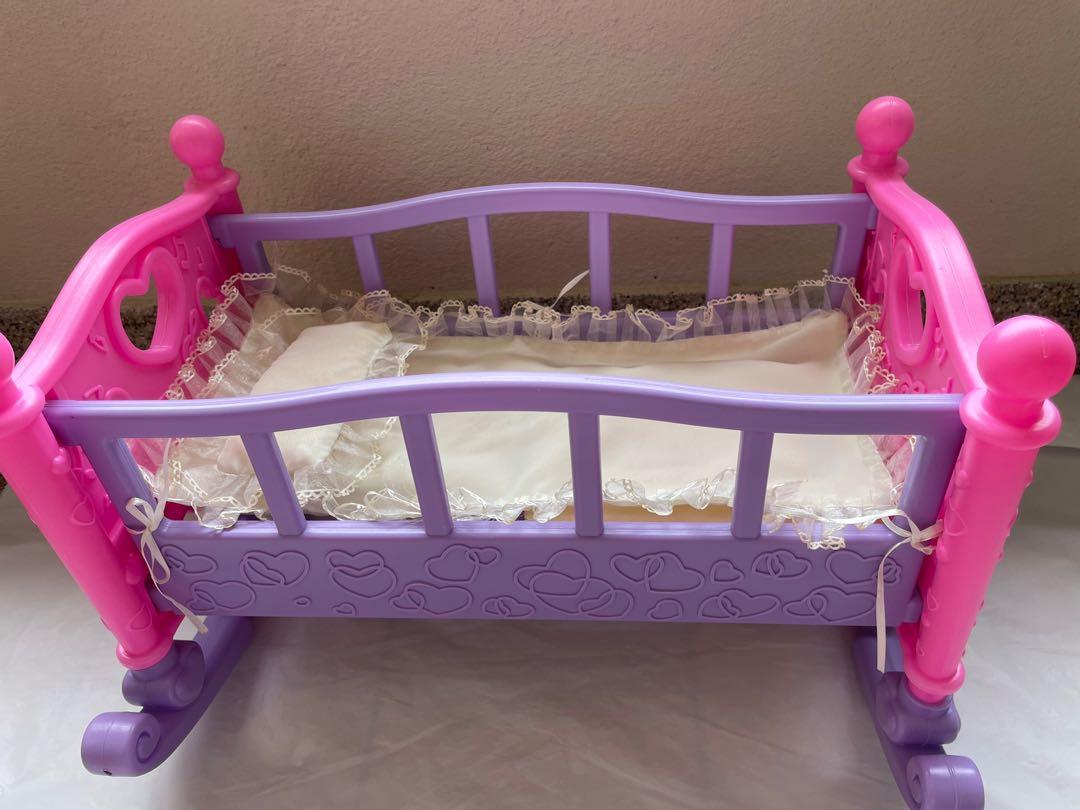 plastic doll cradle
