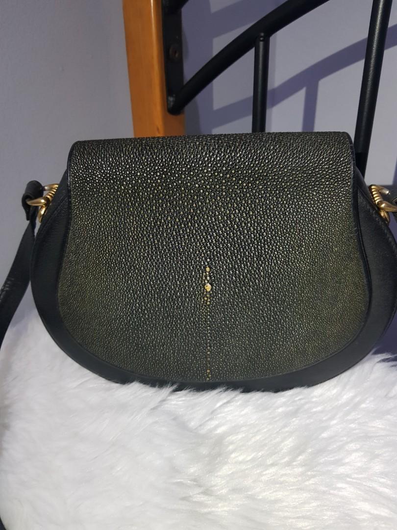Genuine Stingray Leather Shoulder Bag (Category: Luxury Bags & Wallets) located in Paranaque City. Submitted by rizasauthenticitems (Listing ID 1130968785, Image 1). Description: Genuine Stingray Skin Vintage Leather Shoulder Bag Very good condition with gold hardware with 1 compartment inside with magnetic closure.