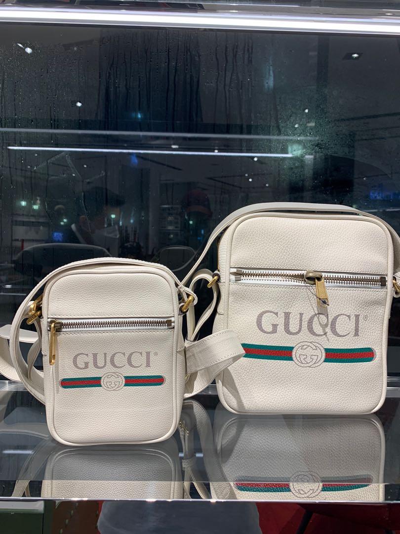 Authentic Gucci White Logo Print Leather Messenger Bag