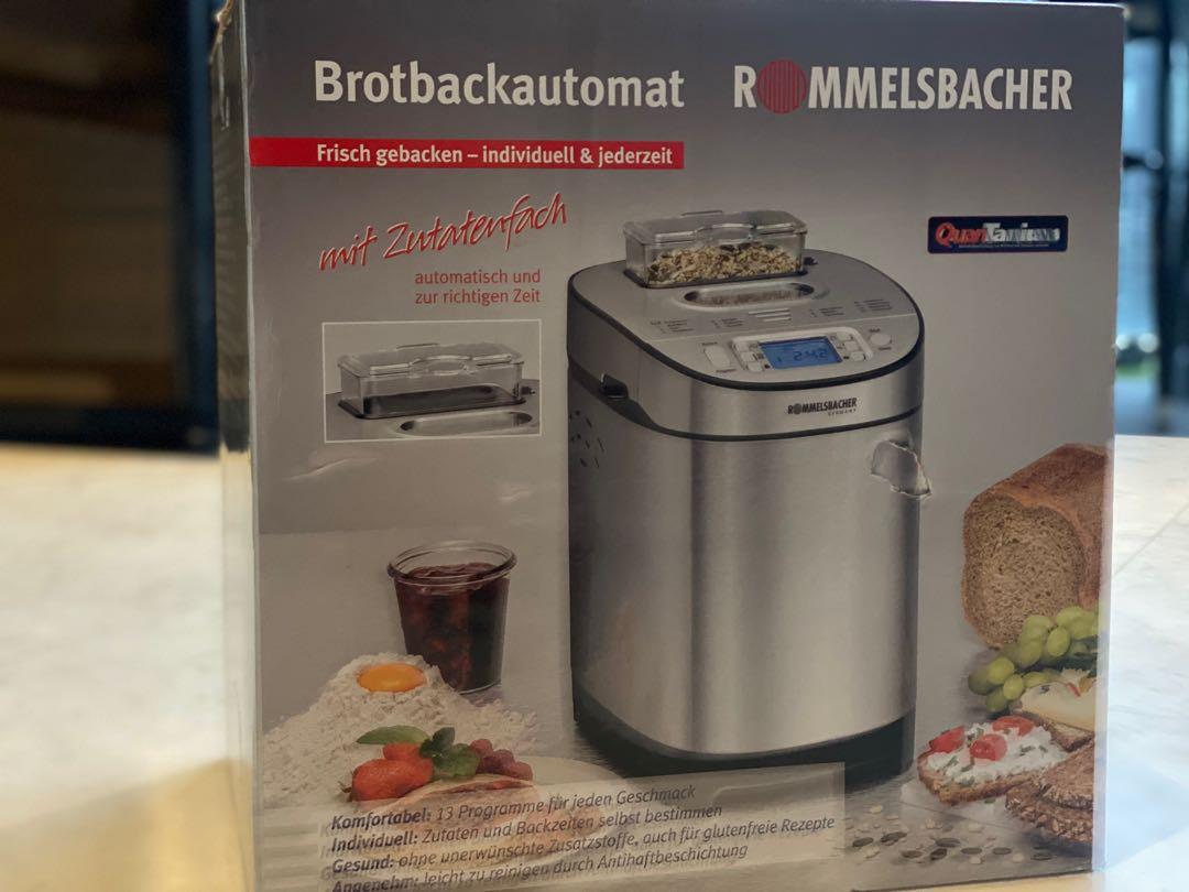 Newish Breadmaker (Category: Breadmakers) located in Singapore. Submitted by t_5ky (Listing ID 1130950883, Image 3). Description: Newish Rommelsbacher Breadmaker BA550 w/ Electric Knife EM150 Used < 5x - Reliable German Appliance - Automatic ingredients container for nuts/fruits - 2 bread size : 700 g & 900 g (Small (2) and Medium (4) size family) Product Feature - High Wattage : 550 W - Dimensions : (W) 22 X (D) 29.5 x (H) 33 cm - Stainless stee